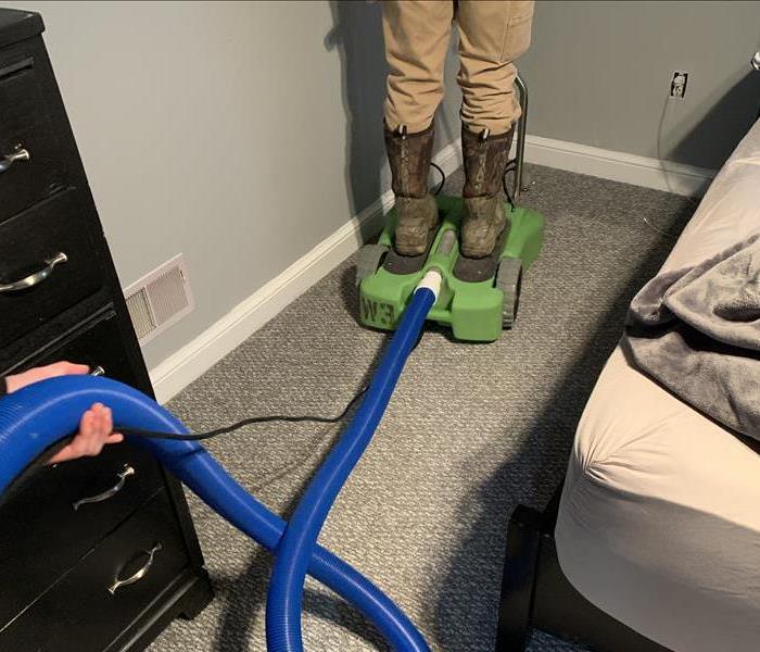 extracting wet carpet after ground water entered the bedroom